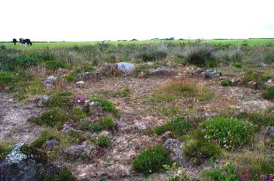 Hut circle with doorway in foreground